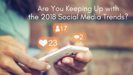 Social media on mobile device with text are you keeping up with the 2018 social media trends